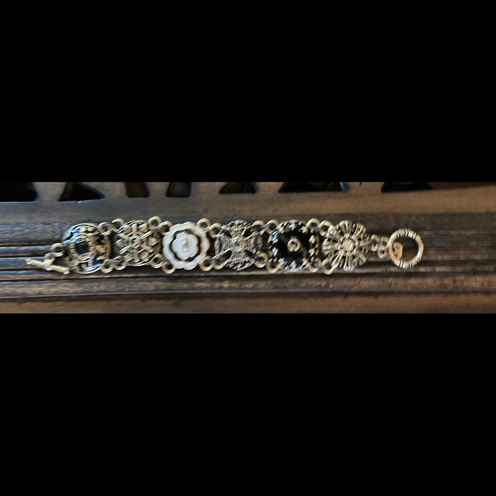 St. John Knits collector’s charm bracelet